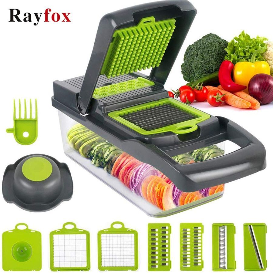 The image shows a Rayfox vegetable slicer with a variety of vegetables, including carrots, capsicum, bell pepper, onion, and leafy vegetables, as well as a mandoline slicer and a vegetable cutter. The text on the image reads "Rayfox Vegetable Slicer and Dicer".