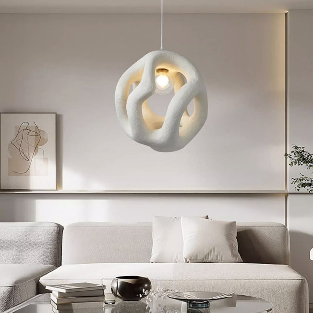 The image is a product description of a creative chandelier. It is a spherical pendant light with a unique design. The light is made of a white material, possibly ceramic or porcelain, and has a textured surface. The dimensions of the light are shown in the image, with the product dimensions ranging from 45cm to 50cm. The product is called "Creative Chandelier" and it has a high density polystyrene material, which is used to create a high-density polyethylene material. It also has a space-restaurant/bar/living room, etc. The product is made from a combination of materials such as wood, metal, and plastic, and is suitable for use in a variety of lighting applications. The size of the pendant is 45cm, with a diameter of 45cm and a height of 50cm, and the craftsmanship is hand-sculptured.